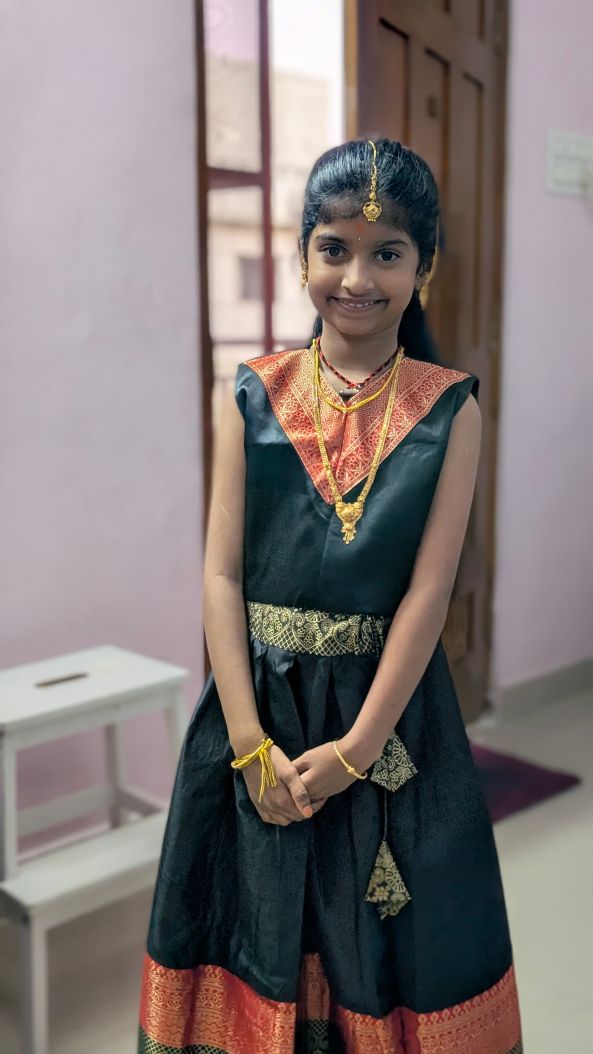 Verified Flipkart buyer photo showing the black-and-red lehenga choli fabric