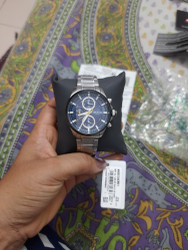 Titan NP90104KM01 Octane OTS 3 Wells Analog Watch For Men
