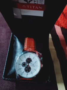 Titan 9441sl01 hotsell smart steel watch