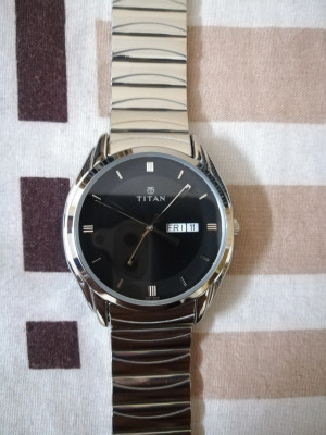 Titan watch online 1578 sac price