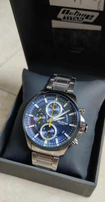 Titan NP90104KM01 Octane OTS 3 Wells Analog Watch For Men