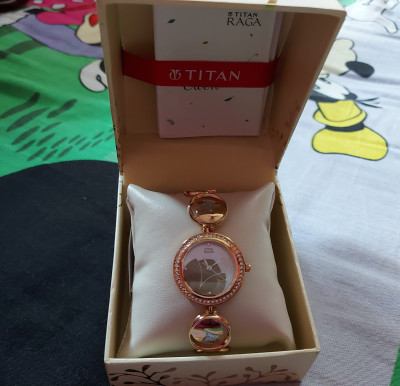 Titan nh2539km01 raga watch hot sale