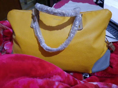 Flipkart enhenced beauty oriflame yellow travel bag