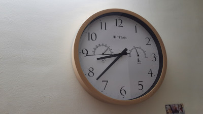 Titan wall clock with temperature 2025