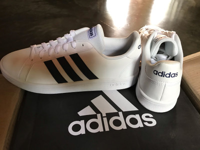 Adidas white shoes with black stripes on one side clearance
