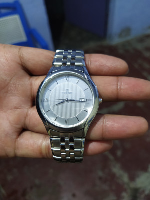Titan NQ1494SM01 Steel Analog Watch For Men Buy Titan NQ1494SM01 Steel Analog Watch For Men NQ1494SM01 Online at Best Prices in India Flipkart