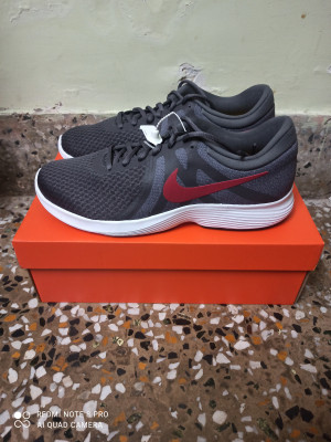 Nike revolution 4 sales harga
