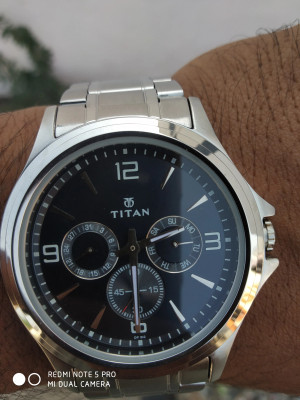 Titan watch hot sale 1698saa price