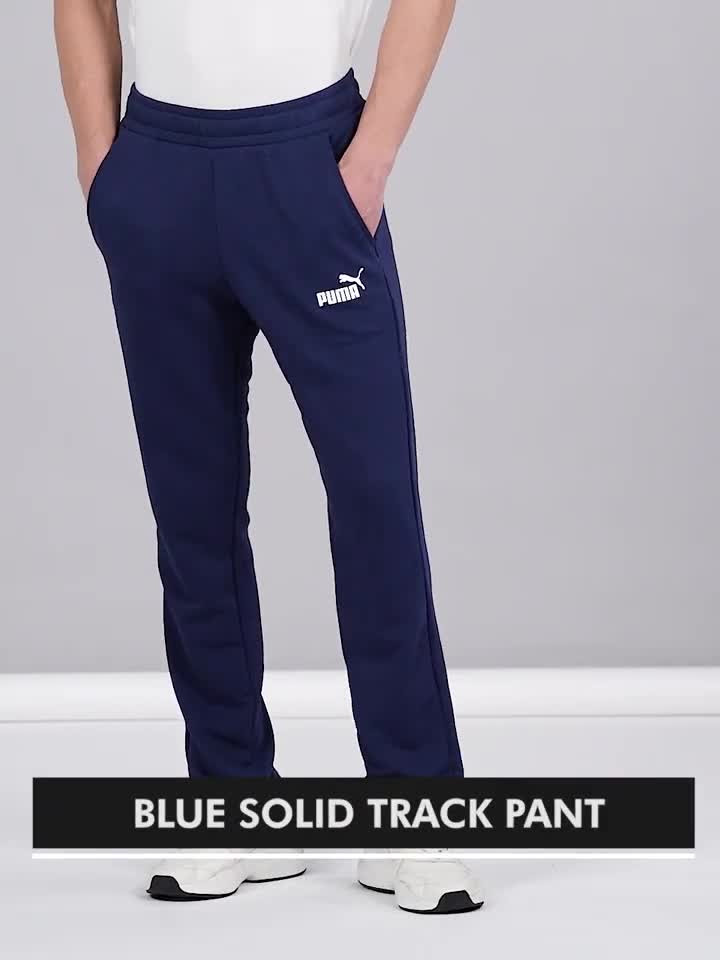 PUMA ESS Logo Pants Solid Men Blue Track Pants - Buy PUMA ESS Logo