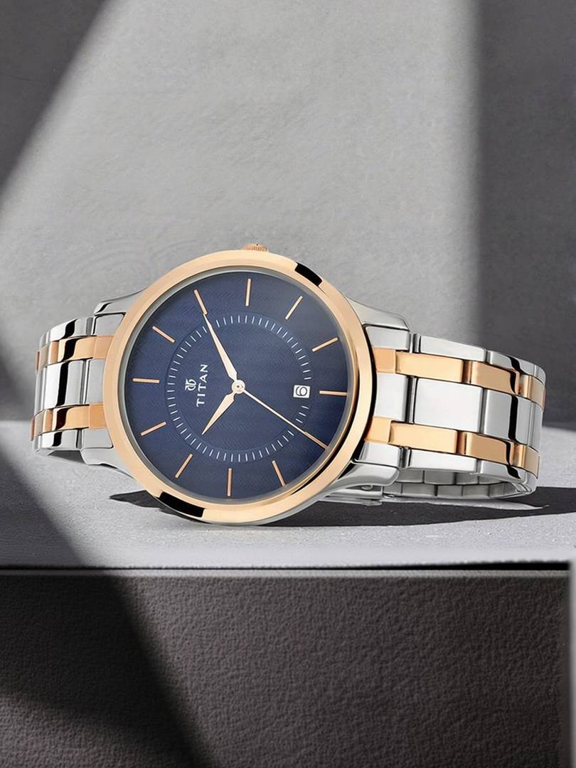 titan np1825km01 karishma blue dial silver rose gold stainless steel strap analog watch men