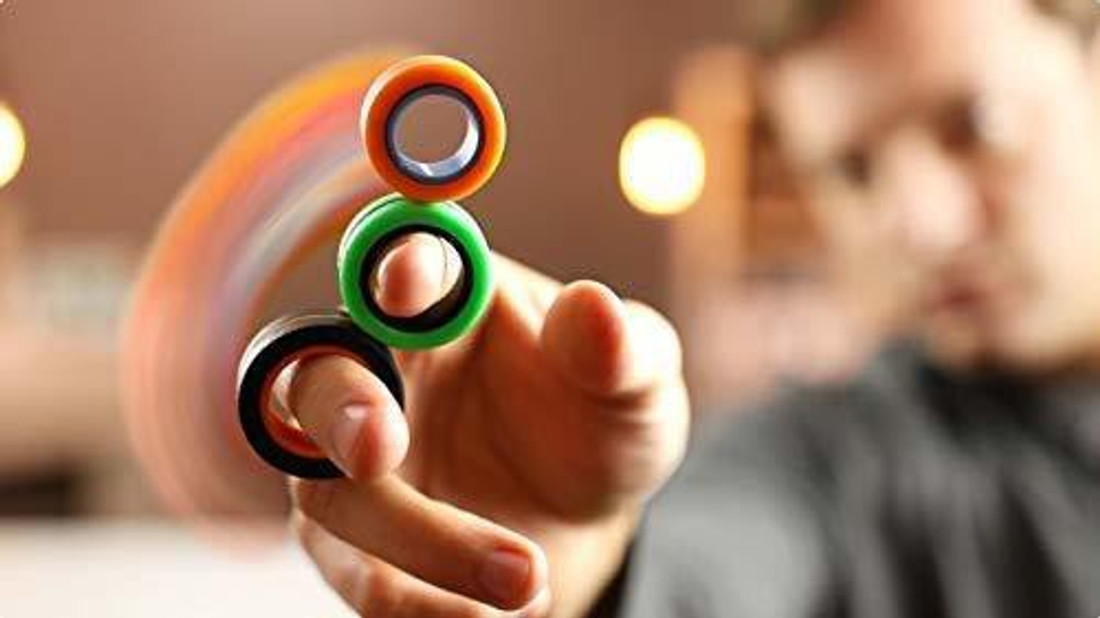 Spinning rings cheap toy