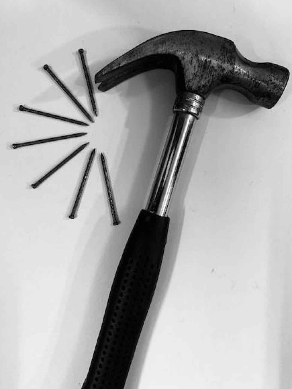 Hammer Striking Nail Photograph by Tom Branch - Pixels