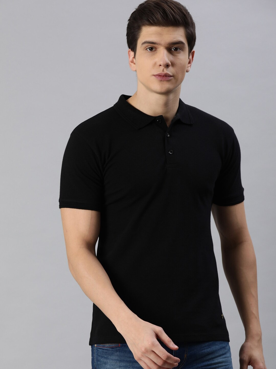 Image of Roadster Men Solid Polo Neck Pure Cotton Green T-Shirt
