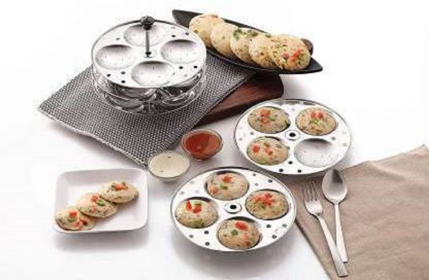 Image of UKRAINEZ Stainless Steel 4 Layers idly Maker Plates with Stand Holes for Pressure Cooker, Idli Stand /Idli Maker Makes 16 Large Size Idlis at Once Standard Idli Maker (4 Plates , 16 Idlis ) Induction & Standard Idli Maker (4 Plates , 16 Idlis )