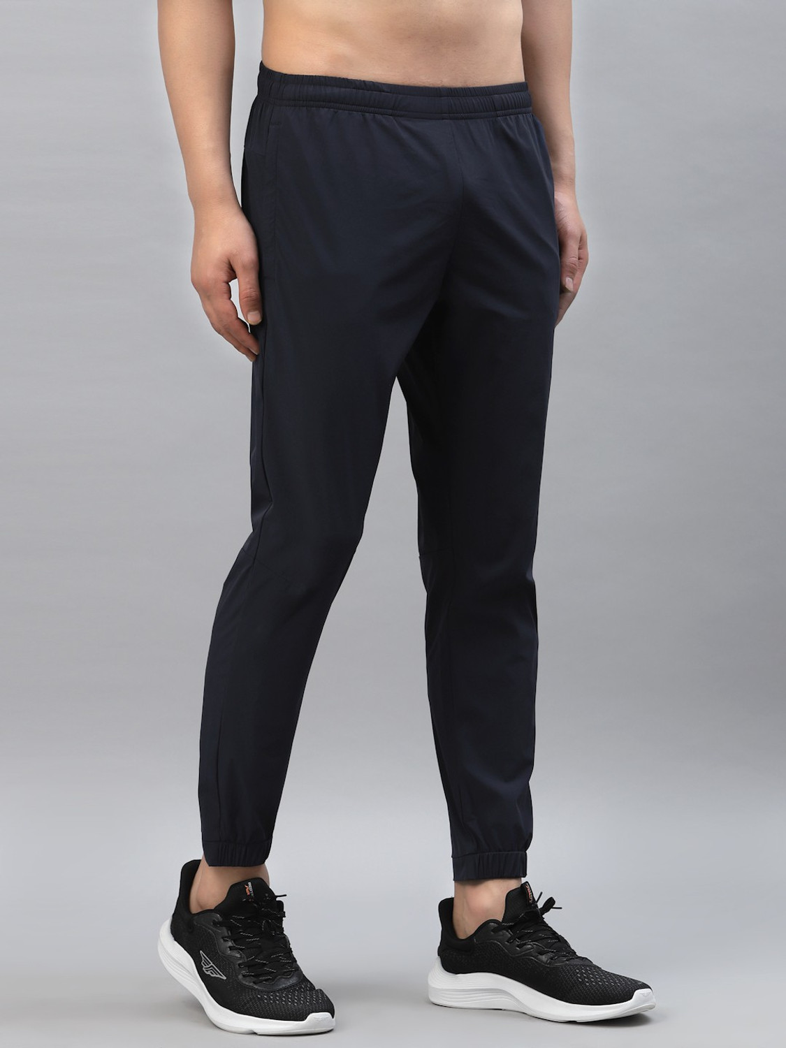Image of RED TAPE Men Solid Blue Track Pants