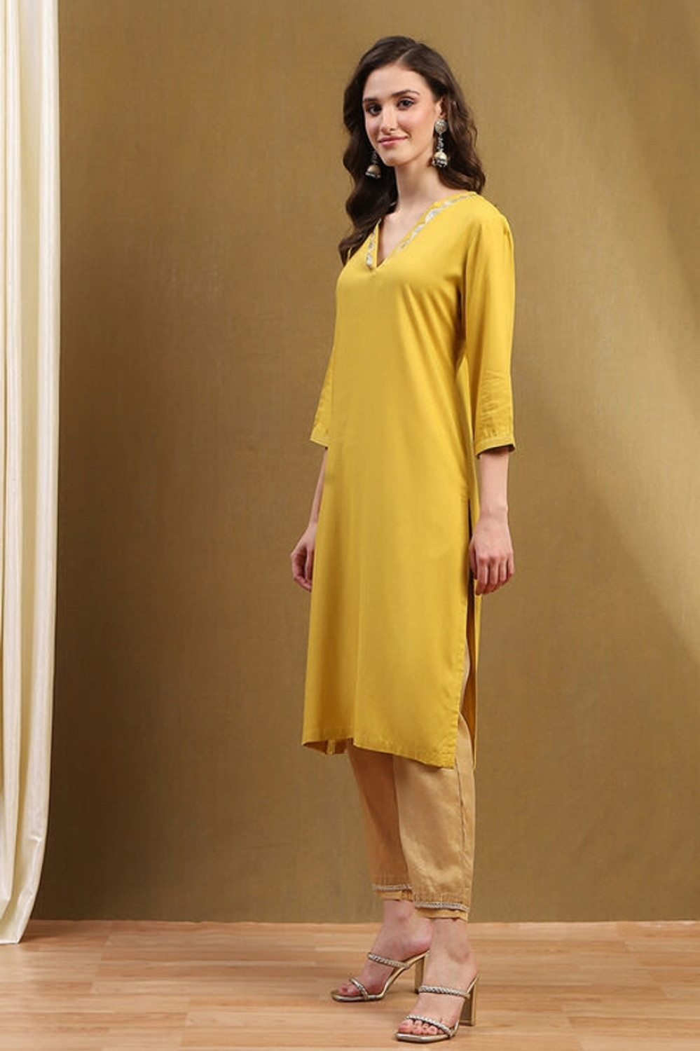 Image of BIBA Solid Viscose Rayon Straight Kurta for Women (Yellow)