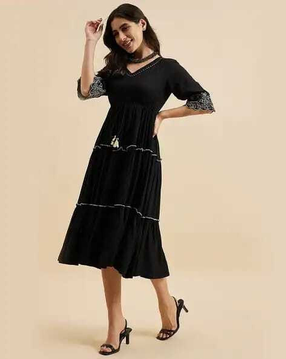 Image of NKRM Solid Viscose Rayon Flared Kurta for Women (Black)