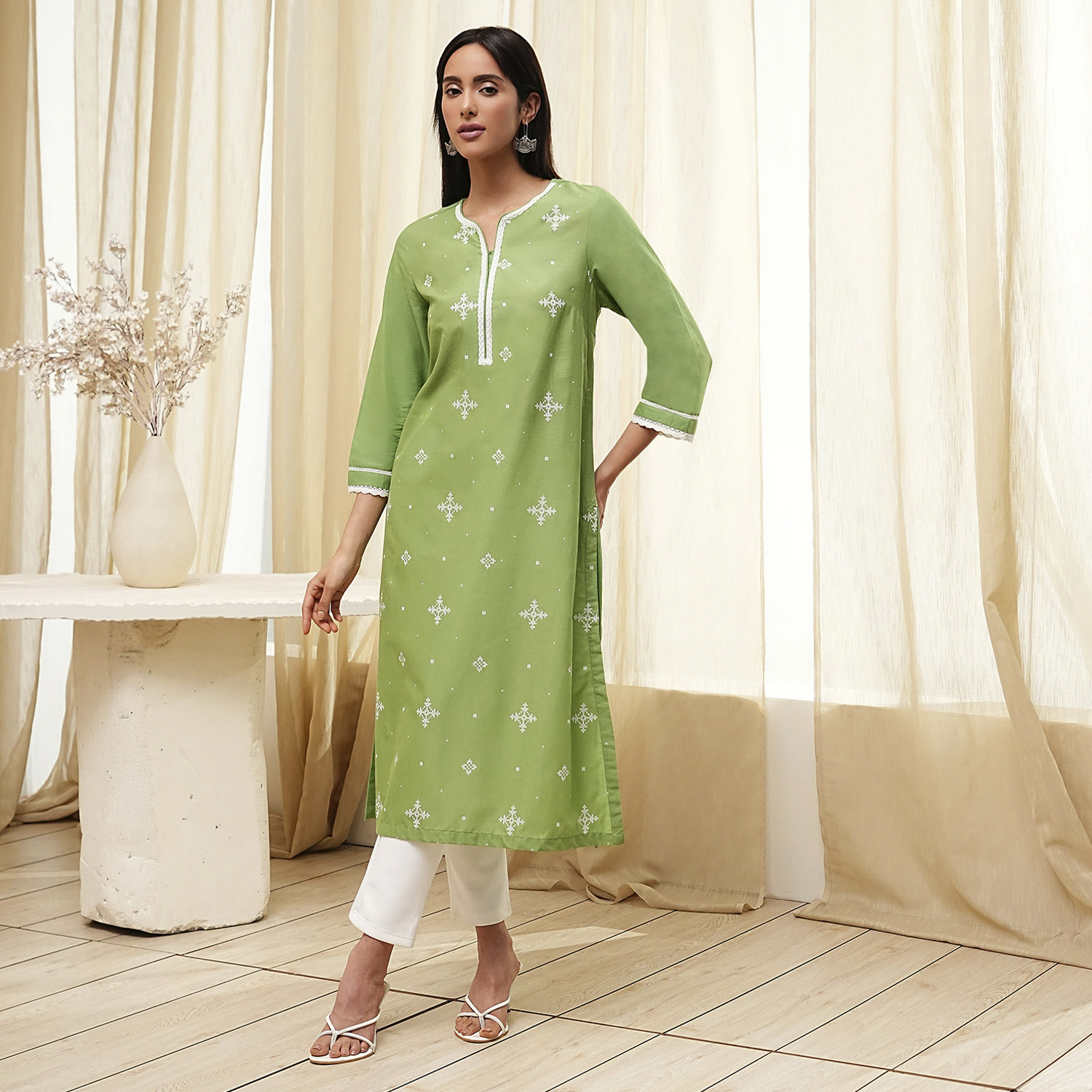 Image of BIBA Solid Viscose Rayon Straight Kurta for Women (Yellow)