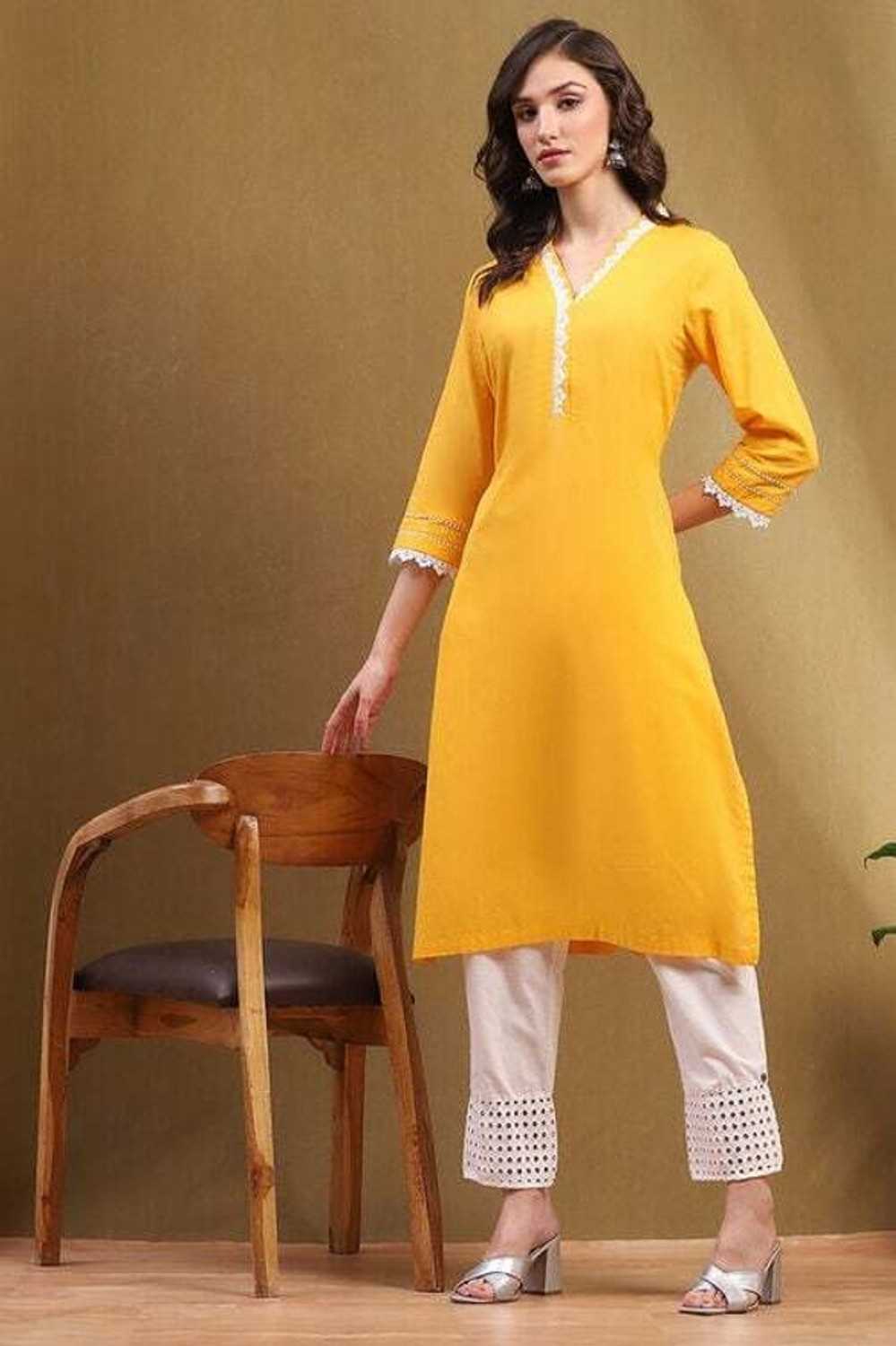 Image of BIBA Solid Viscose Rayon Straight Kurta for Women (Yellow)