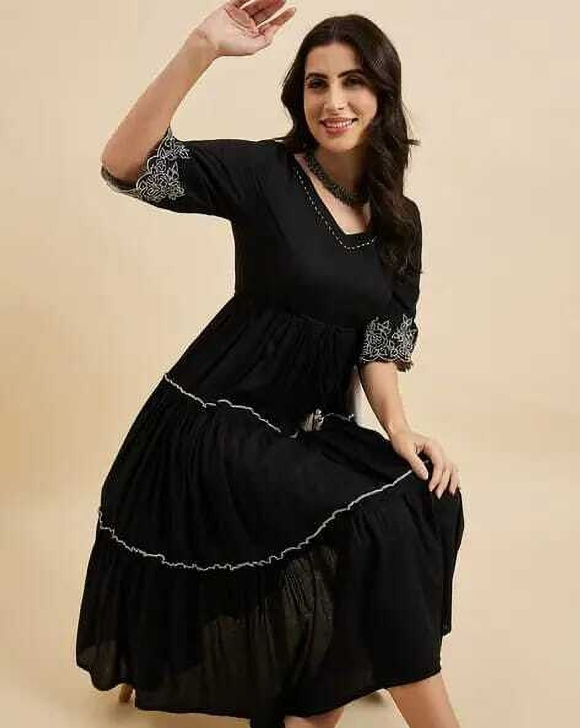 Image of NKRM Solid Viscose Rayon Flared Kurta for Women (Black)