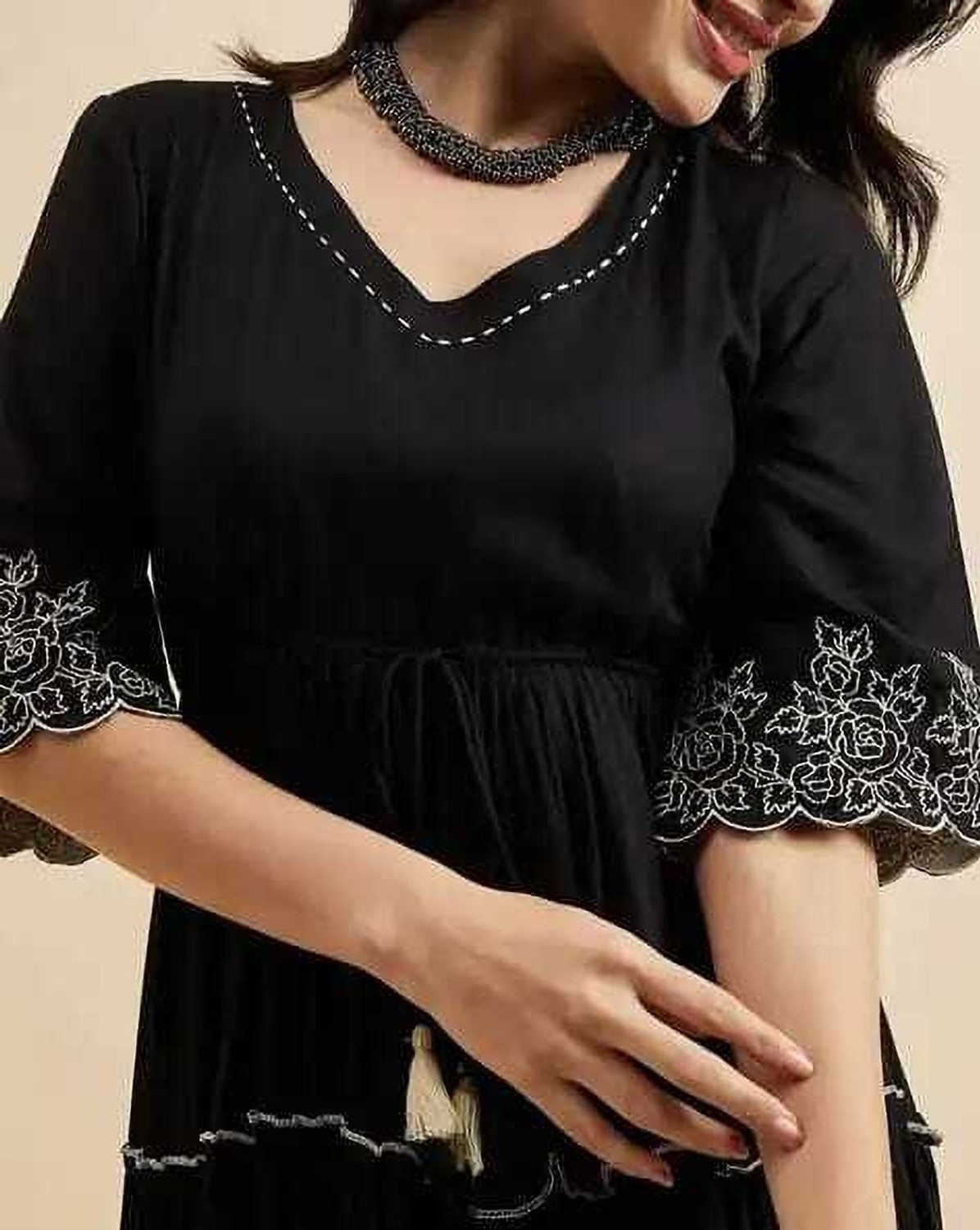 Image of NKRM Solid Viscose Rayon Flared Kurta for Women (Black)