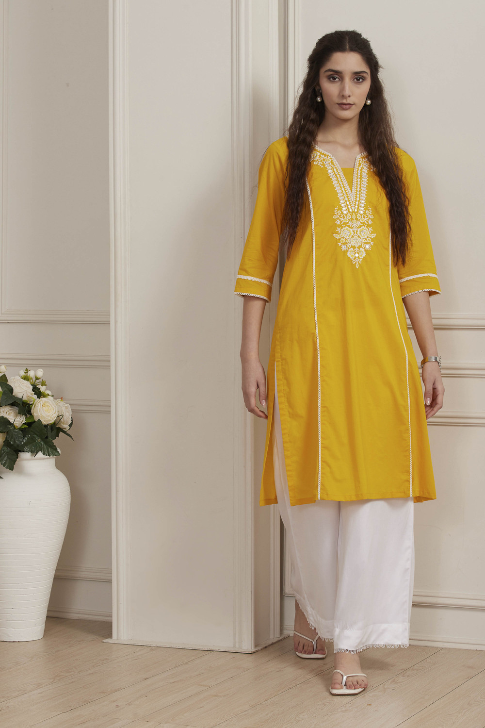 Image of BIBA Solid Viscose Rayon Straight Kurta for Women (Yellow)
