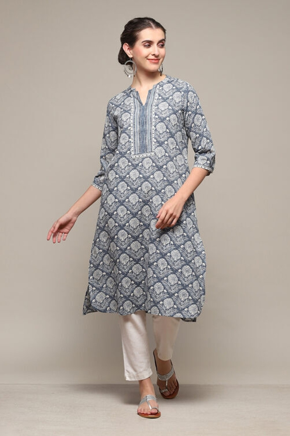 Image of BIBA Solid Viscose Rayon Straight Kurta for Women (Yellow)