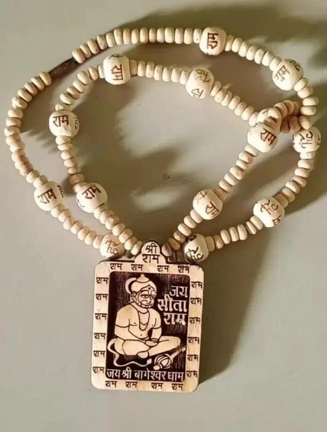 Image of BRAJSTORE Bageshwar Dham Tulsi Kanthi Mala with Hanuman ji (Heart Shape Locket) Wood Locket