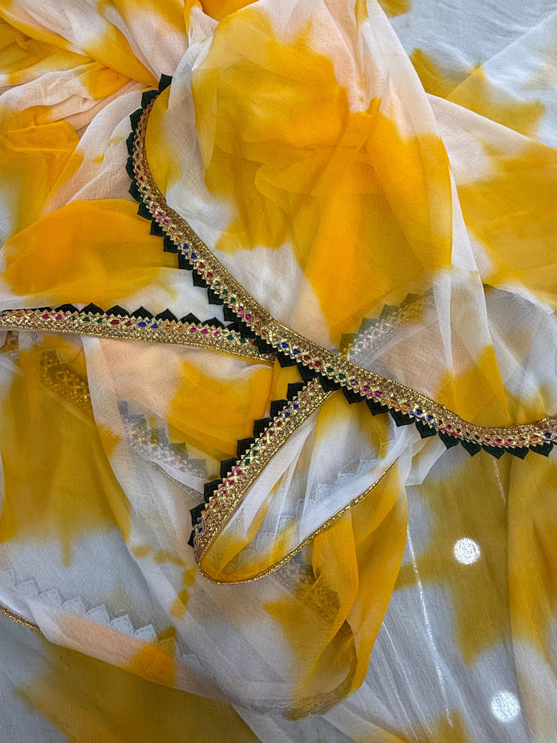 Image of BL Group Tie-Dye Assam Silk Chiffon Saree (Red, Yellow, Dark Green, Gold)