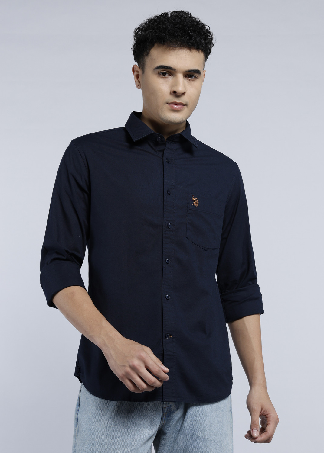 Image of U.S. POLO ASSN. Men Regular Fit Solid Spread Collar Casual Shirt