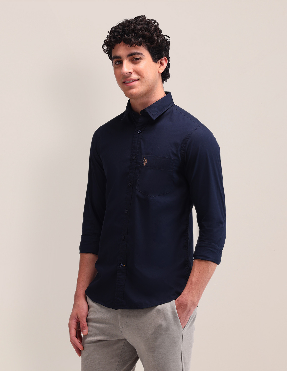 Image of U.S. POLO ASSN. Men Regular Fit Solid Spread Collar Casual Shirt