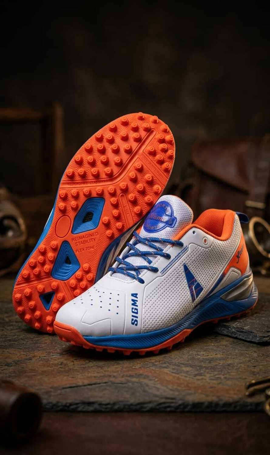 Image of TYKA Storm ETPU Studs Cricket Shoes for Men Sneakers For Unisex (Orange, White , 10)