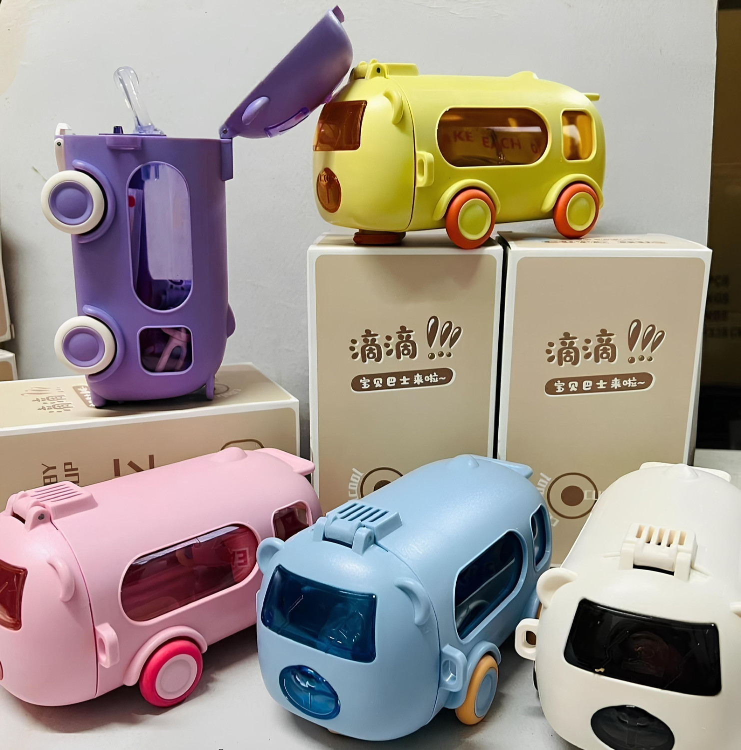 Image of MICASHU Bus Shaped Moving Wheels Detachable Water Bottle with Straw Shoulder Strap (Multicolor)