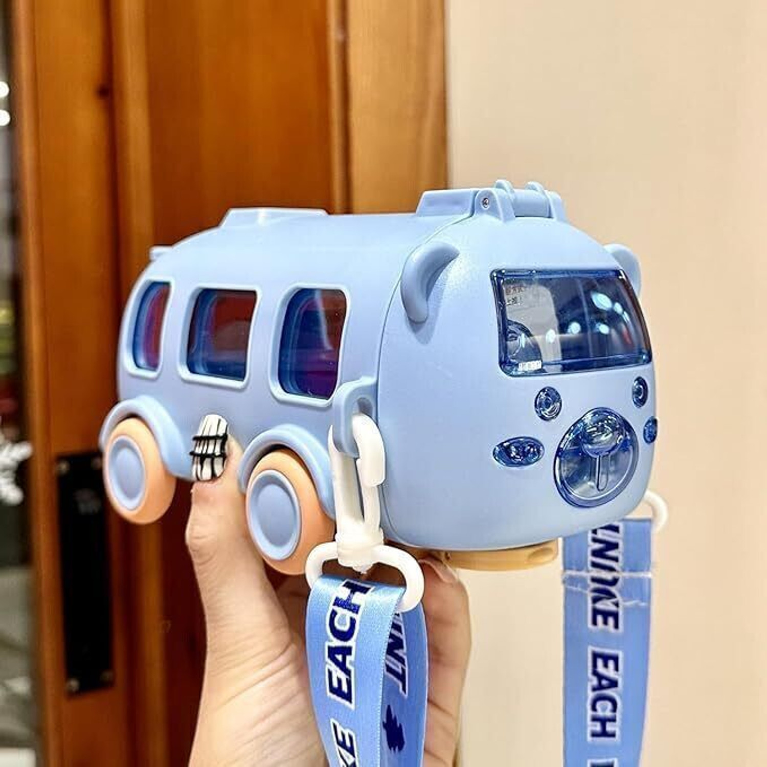 Image of MICASHU Bus Shaped Moving Wheels Detachable Water Bottle with Straw Shoulder Strap (Multicolor)