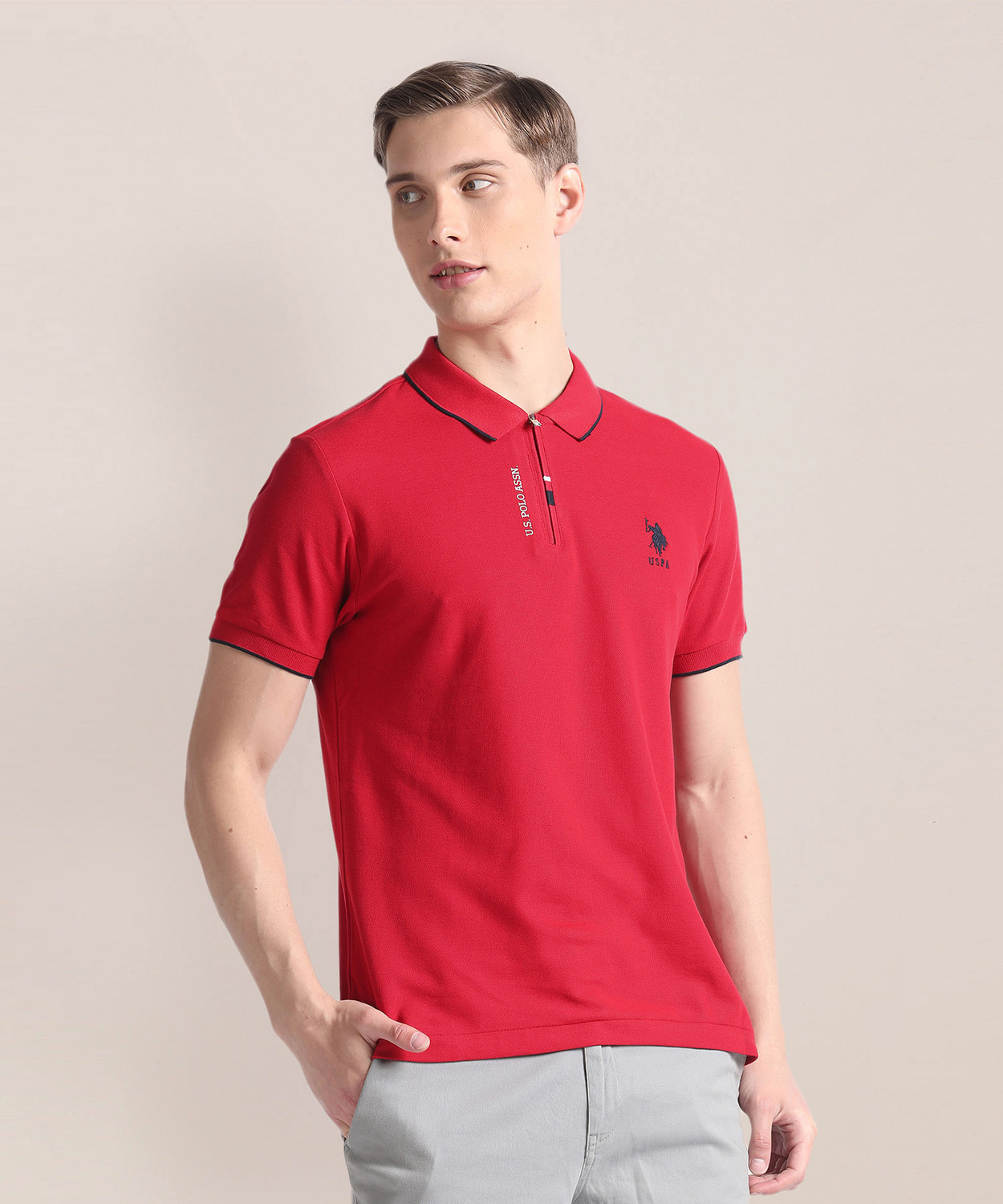 Image of U.S. POLO ASSN. Men Solid Polo Neck Pure Cotton Pink T-Shirt