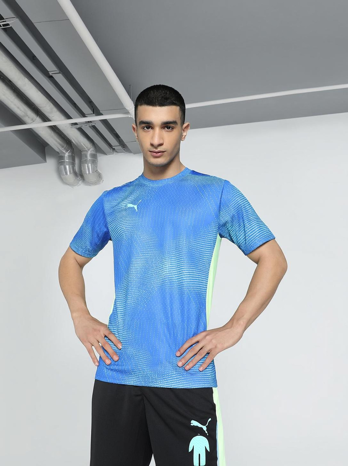 Image of PUMA Men Solid Round Neck Polyester White T-Shirt