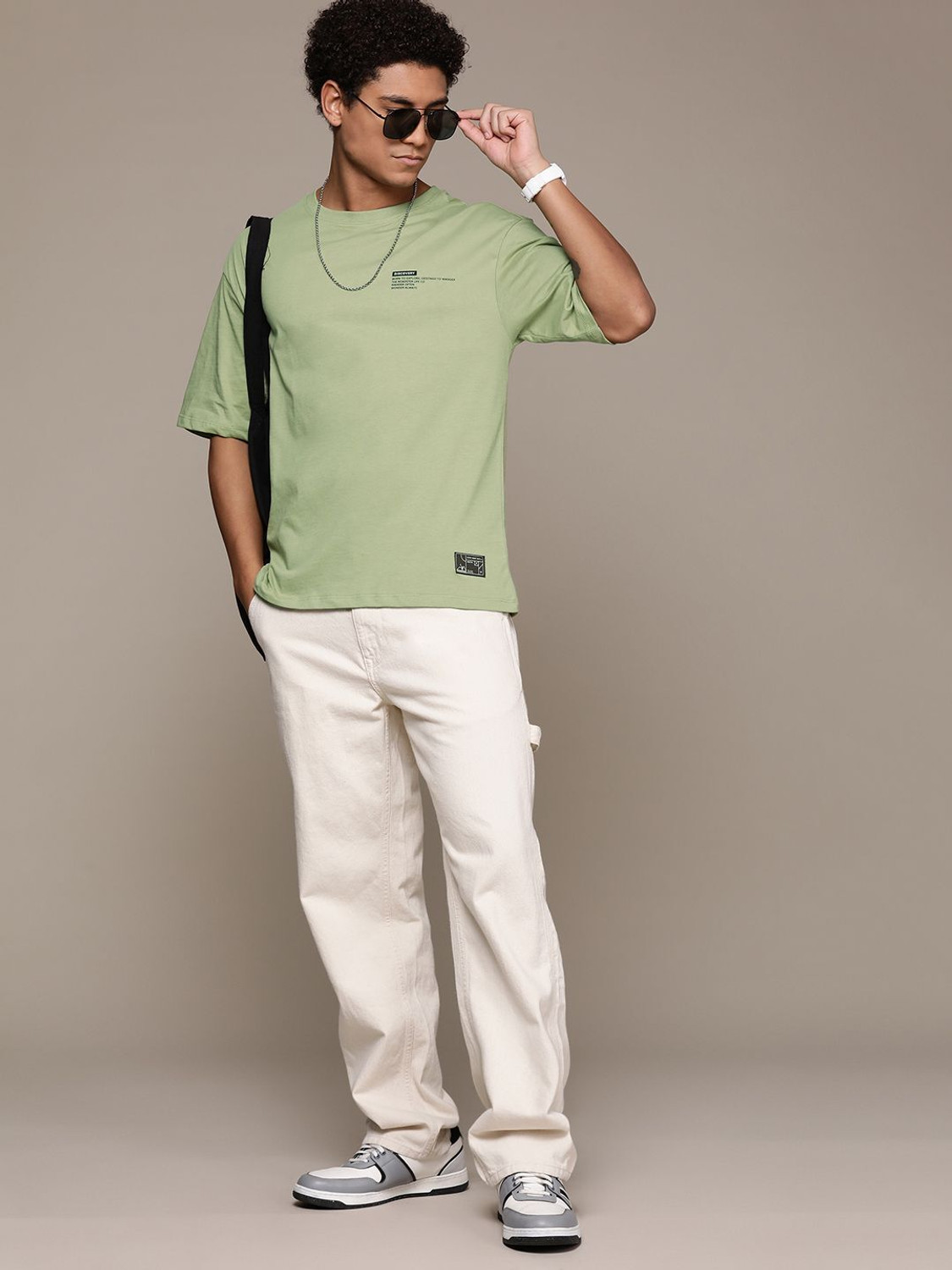 Image of Roadster Men Solid Round Neck Pure Cotton Green T-Shirt