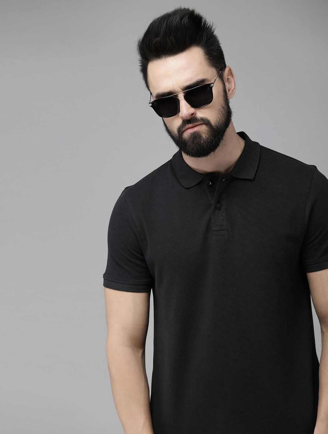Image of Roadster Men Solid Polo Neck Pure Cotton Green T-Shirt