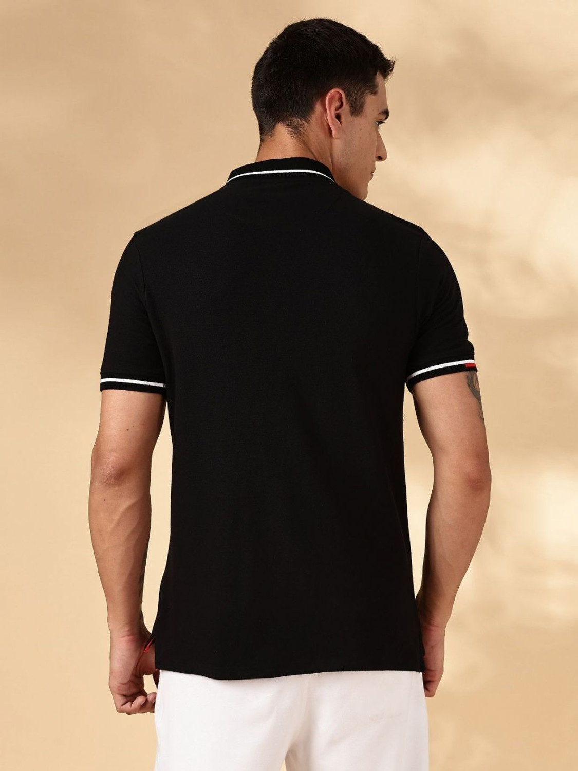 Image of Mast & Harbour Men Solid Polo Neck Pure Cotton Black T-Shirt