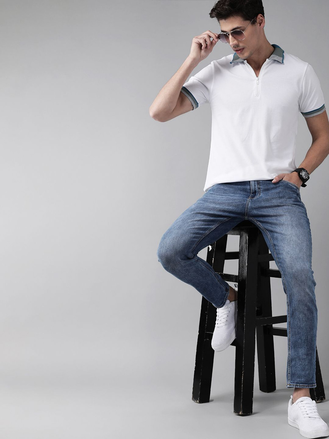 Image of Roadster Men Solid Polo Neck Pure Cotton White T-Shirt