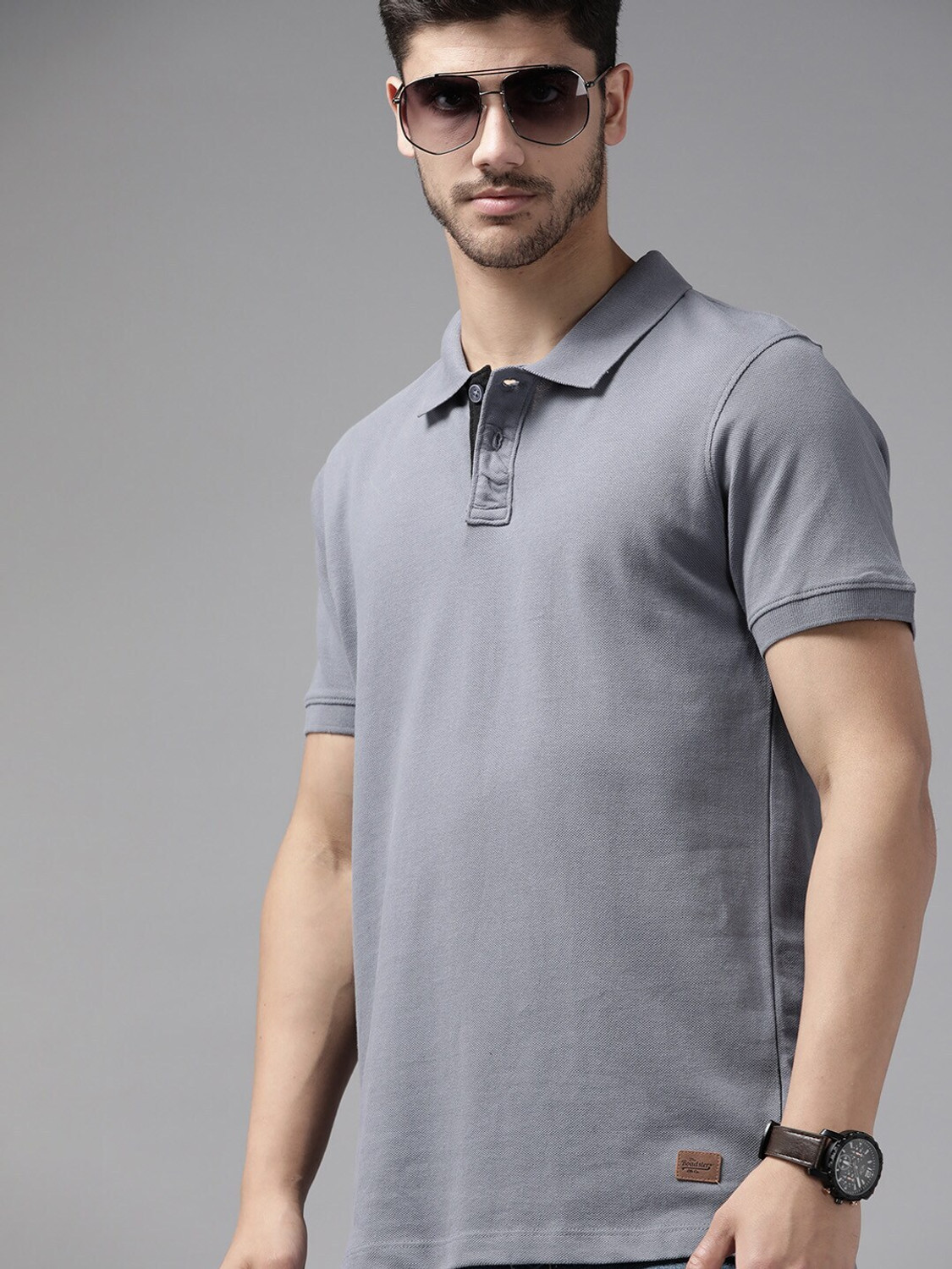 Image of Roadster Men Solid Polo Neck Pure Cotton Green T-Shirt