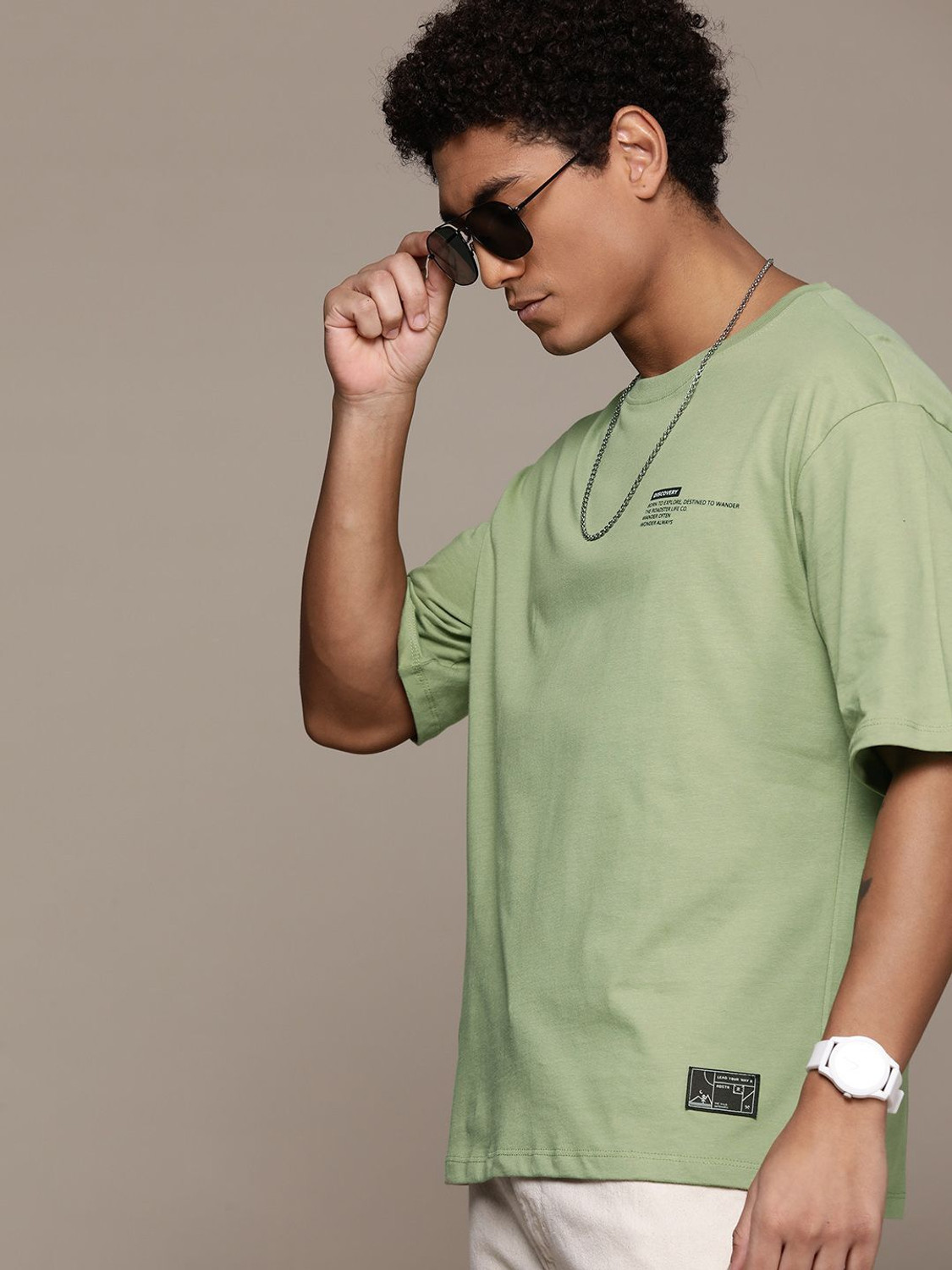 Image of Roadster Men Solid Round Neck Pure Cotton Green T-Shirt