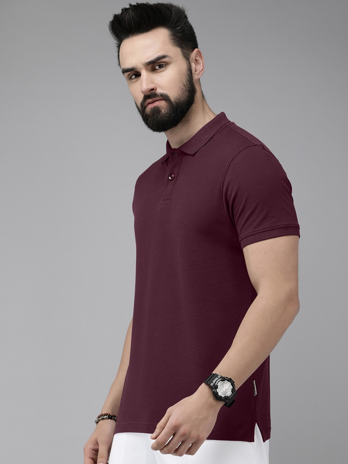 Image of Roadster Men Solid Polo Neck Pure Cotton Green T-Shirt