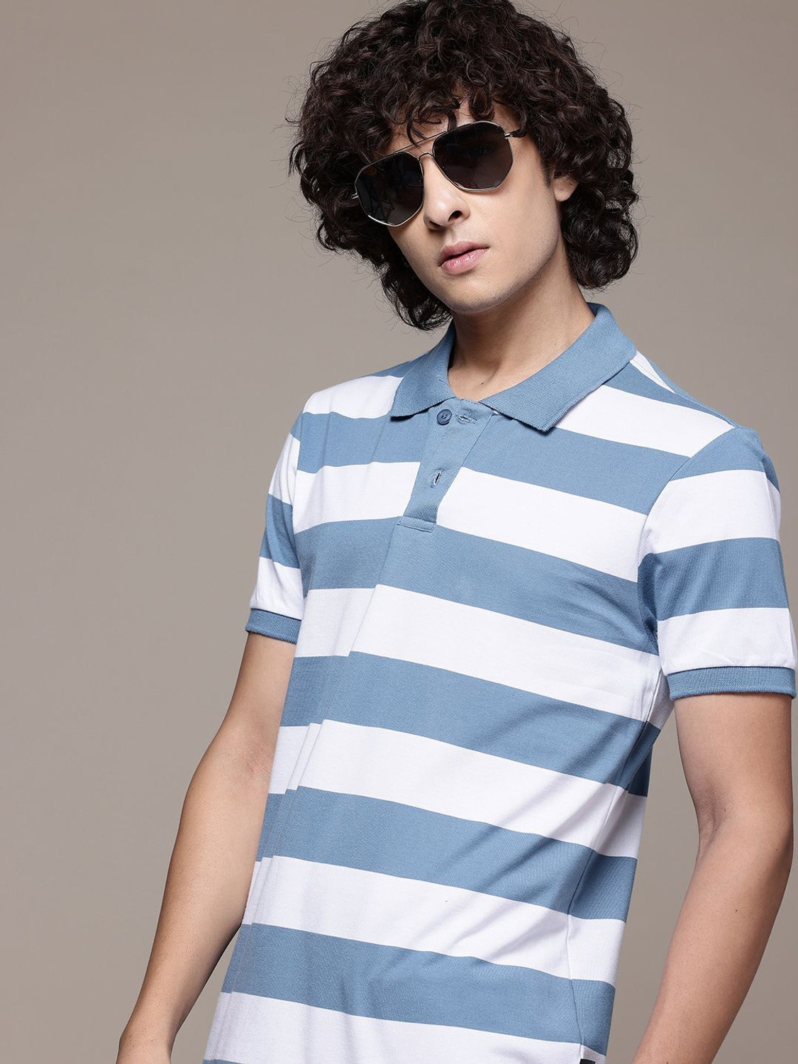 Image of Roadster Men Solid Polo Neck Pure Cotton White T-Shirt