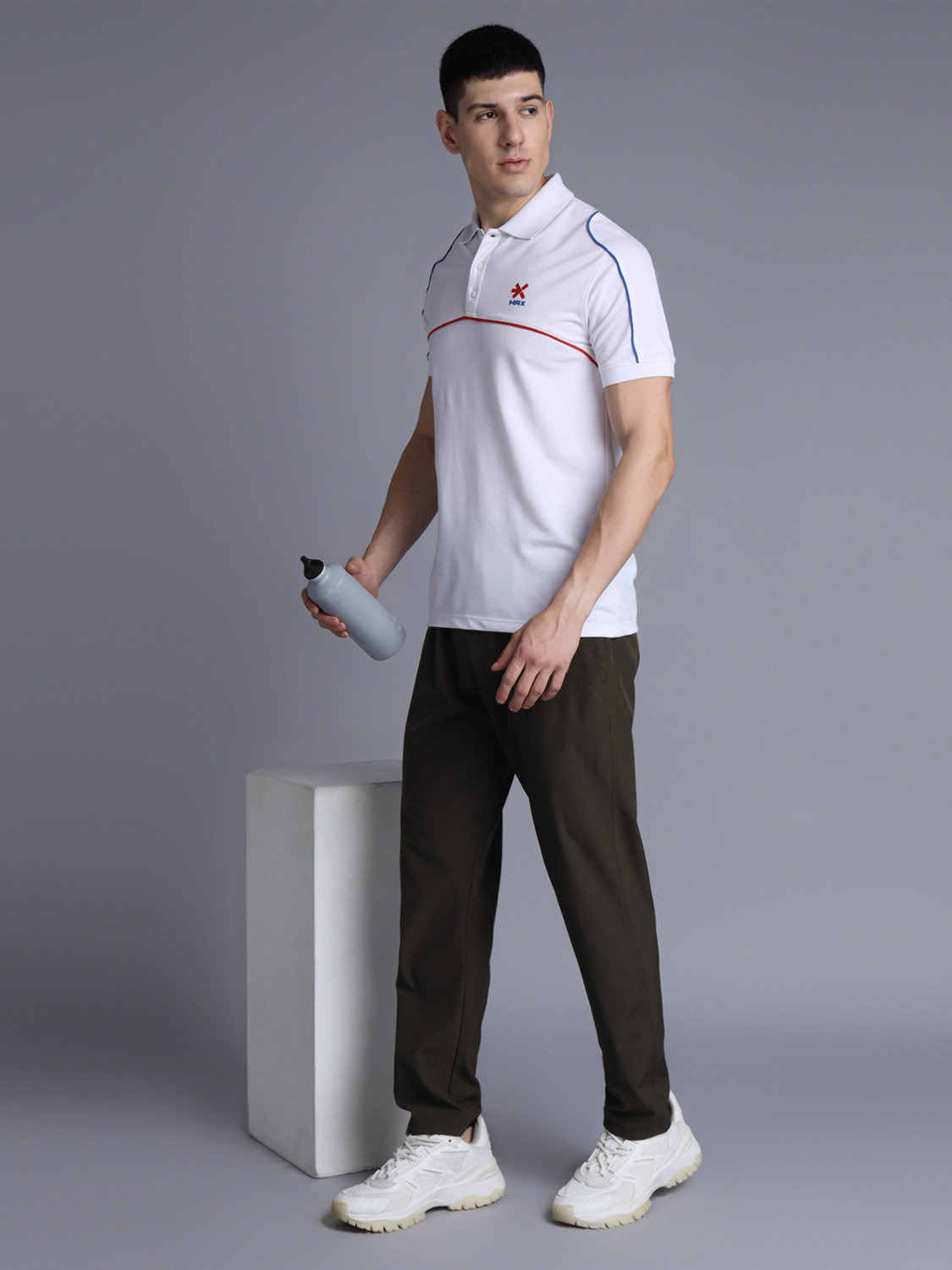 Image of HRX by Hrithik Roshan Men Solid Polo Neck Cotton Blend White T-Shirt