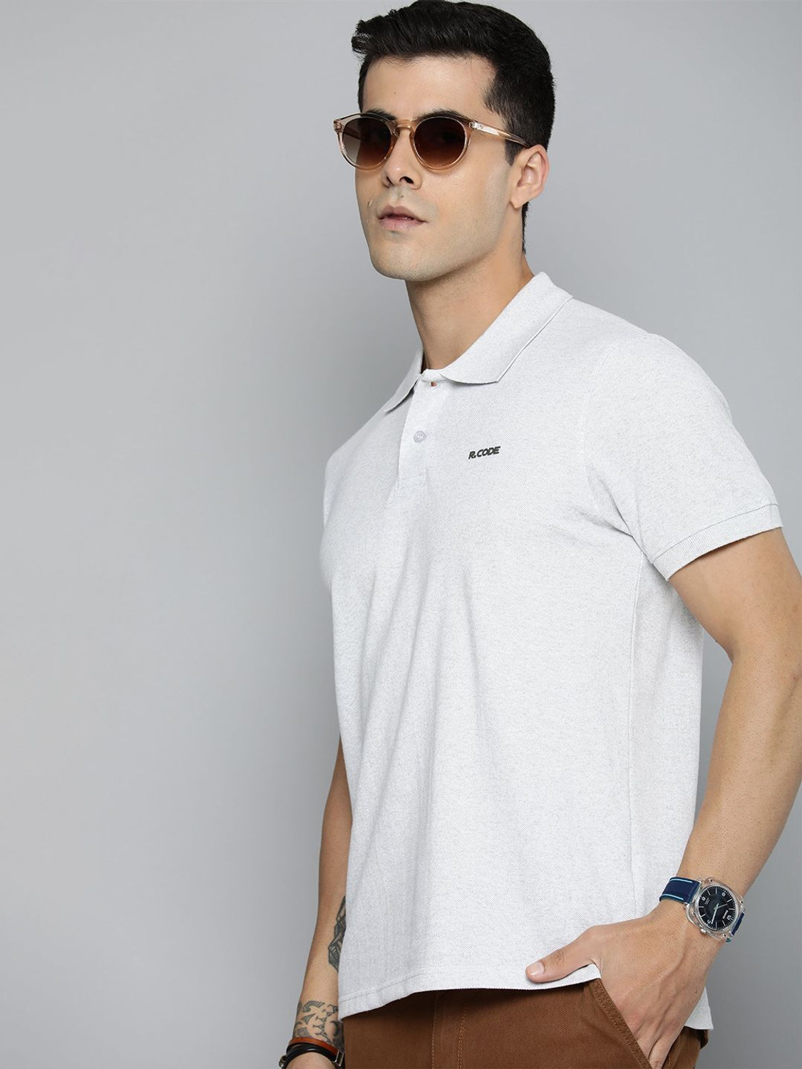 Image of Roadster Men Solid Polo Neck Pure Cotton White T-Shirt