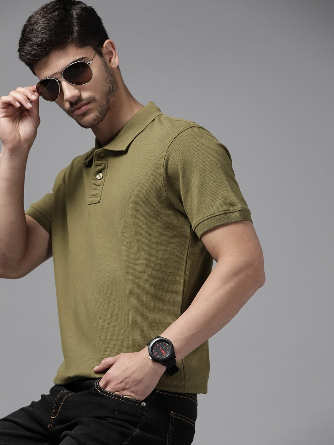 Image of Roadster Men Solid Polo Neck Pure Cotton Green T-Shirt