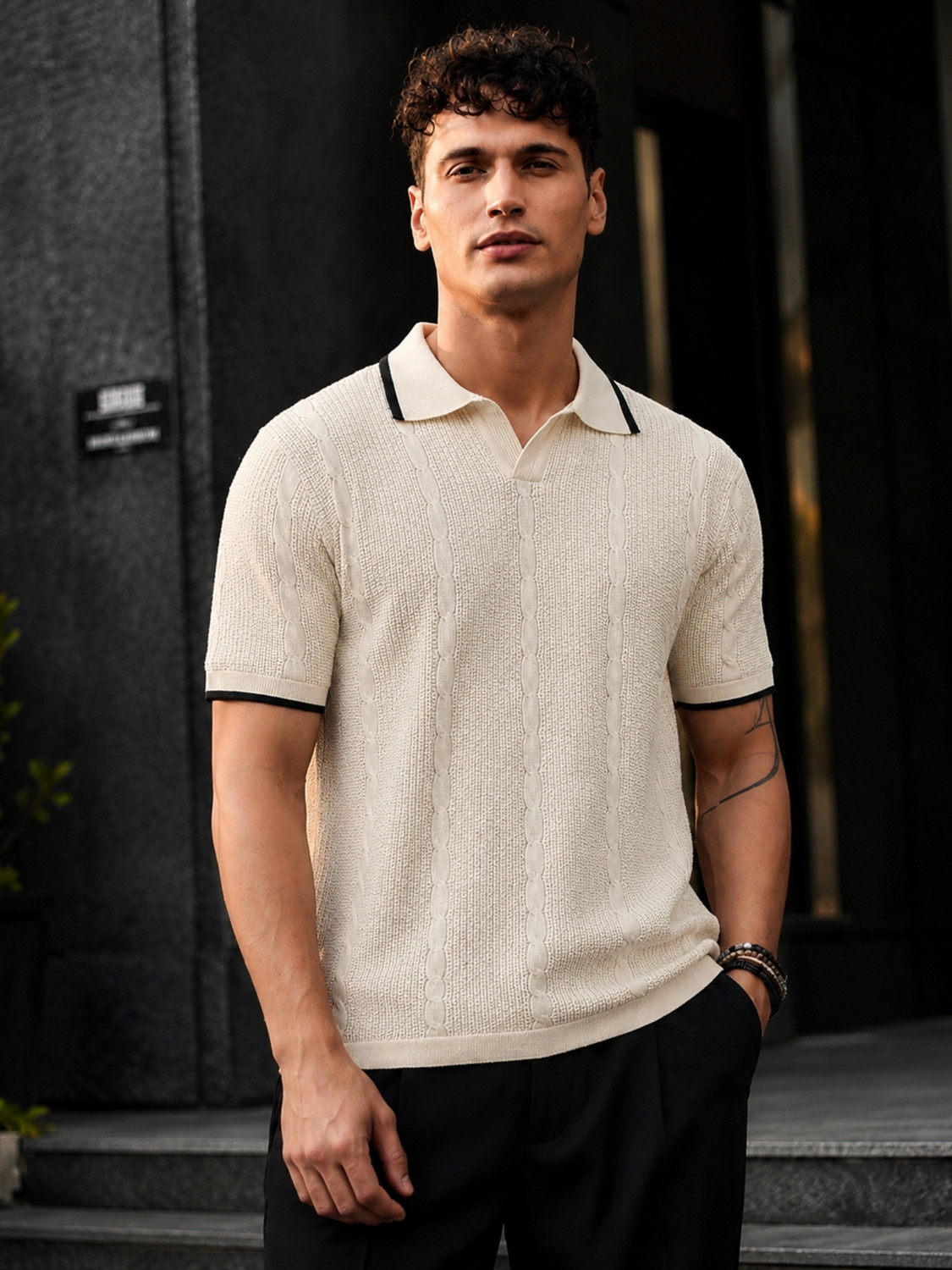 Image of MANIAC Men Solid Polo Neck Pure Cotton Black T-Shirt