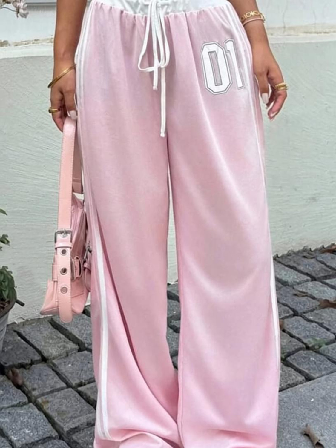 Image of Christy World Women Printed Pink Track Pants