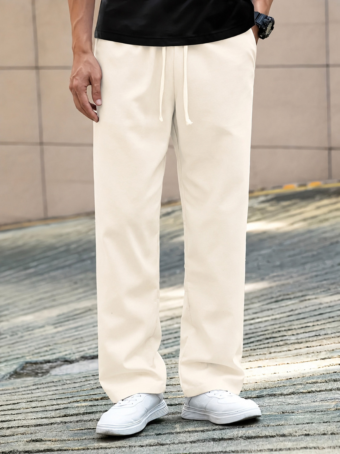 Paralians Men Solid Beige Track Pants - Image 1